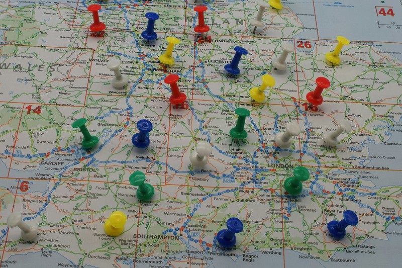 A map of the UK with coloured pins marking various locations covered by Octagon Risk Management's security services - photo by Paul Marlow on Unsplash